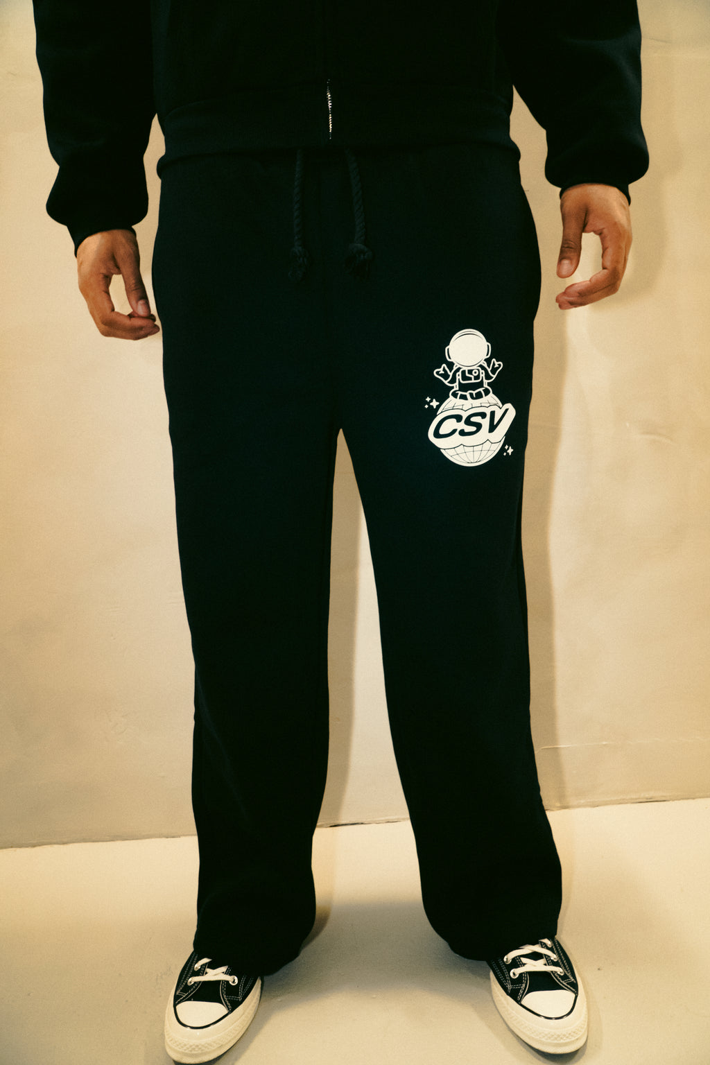Black tracksuit bottoms